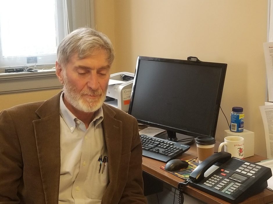 Peter Plumley, the Chief Program Officer at the Museum of Science and Technology in Syracuse at his office. Plumley said radio telescopes are useful because they can go through dust, unlike light telescopes.