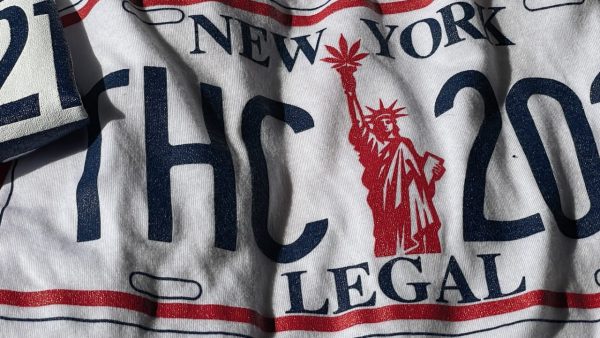 The Higher Calling merchandise highlights the 2021 legalization of marijuana in NY.