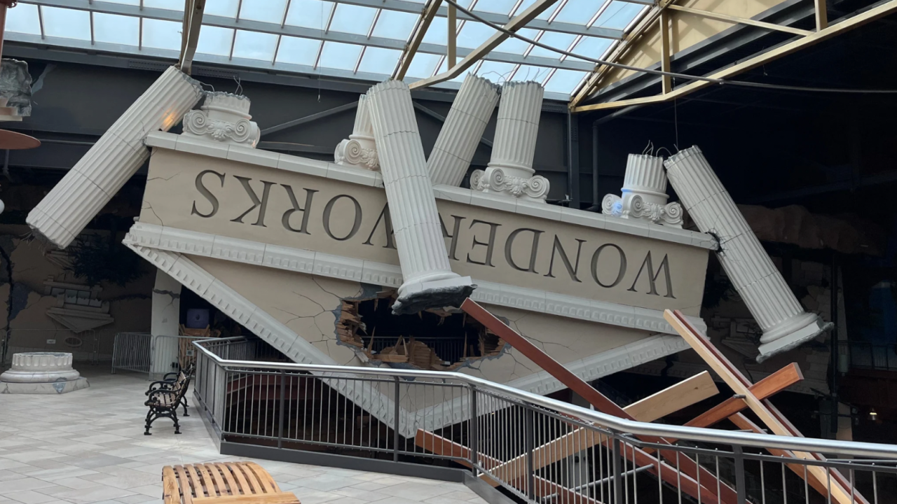 Facade of Wonder Works at Destiny USA mall, designed to look like a traditional building with Roman columns was swept up in a vortex and dropped upside-down into the mall in a violent crash. The words "WONDER WORKS" are etched upside down above the entrance.