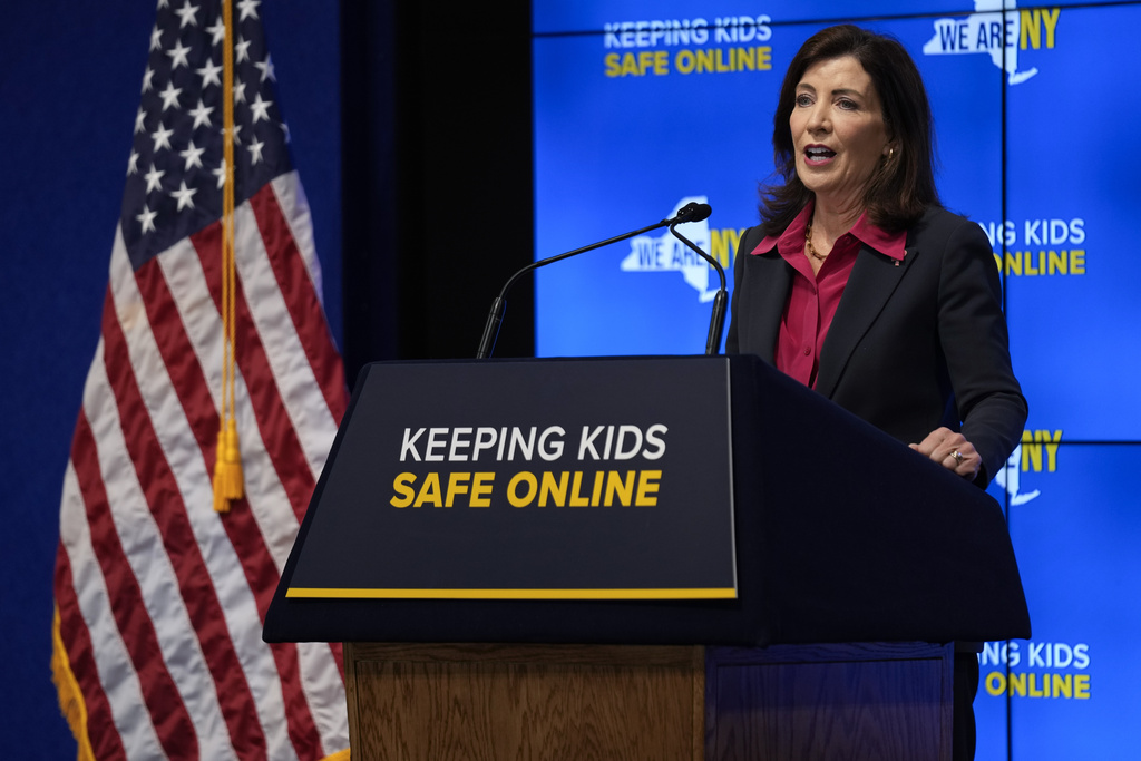 New York Gov. Kathy Hochul speaks during a news conference in New York. New York is bidding to put new controls on social media platforms that state leaders say will protect the mental health of younger users.