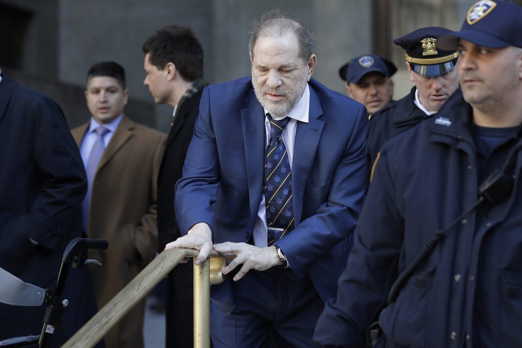 FILE - Harvey Weinstein leaves a Manhattan courthouse after closing arguments in his rape trial in New York, Friday, Feb. 14, 2020. New York's highest court has overturned Harvey Weinstein's 2020 rape conviction and ordered a new trial. (AP Photo/Seth Wenig, File)