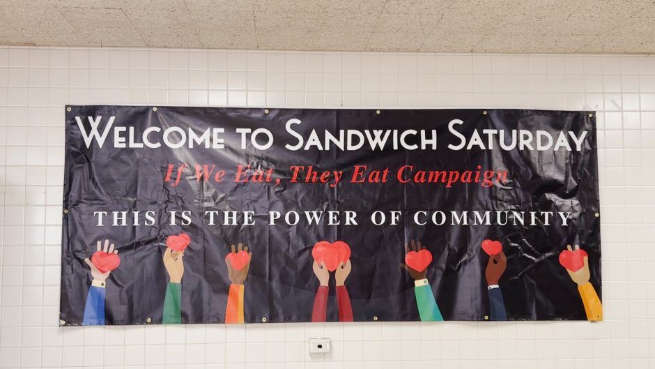 A banner for Sanwich Saturday hangs in Lincoln Middle School