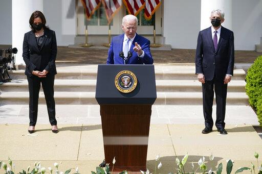 President Joe Biden, accompanied by Vice President Kamala Harris, and Attorney General Merrick Garland, speaks about gun violence prevention in the Rose Garden at the White House, Thursday, April 8, 2021, in Washington