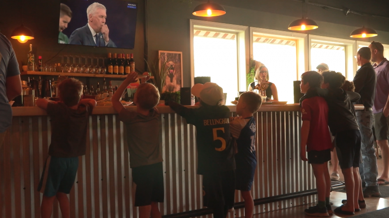 Youth soccer players watch the Champion's League final