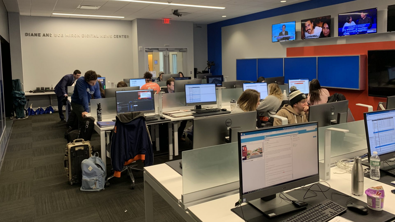 The NCC newsroom with students working