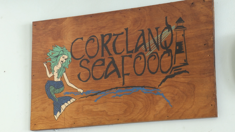 Cortland Seafood wooden sign