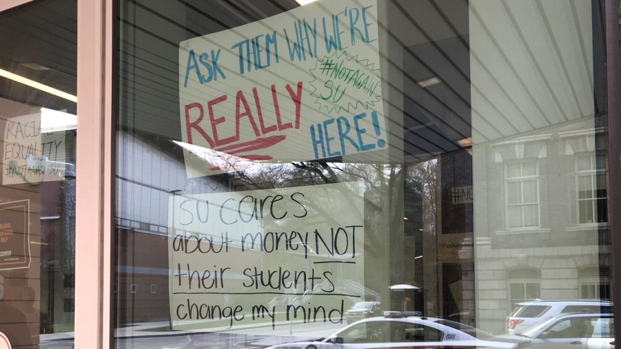 Protest Signs at the Barnes Center