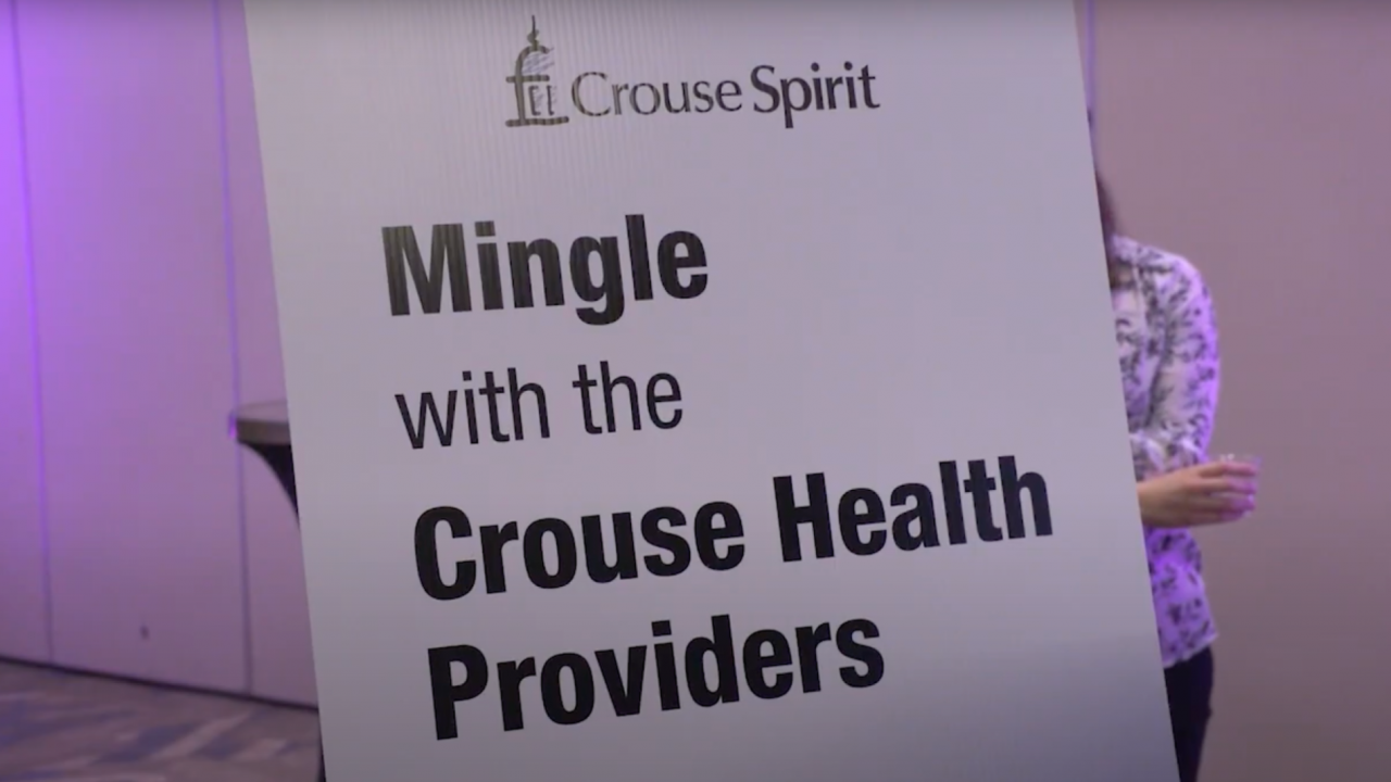 Sign that reads "Crouse Spirit: Mingle with the Crouse Health Providers"