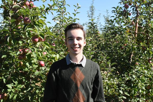 Reporter Wyatt Barmore-Pooley at Beak and Skiff Orchards
