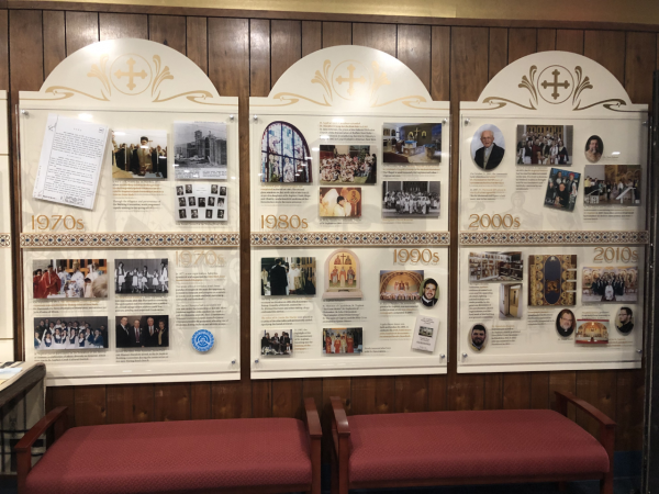A wall at St. Sophia's Greek Orthodox Church is covered with pictures of church members, including classes on Sunday school.