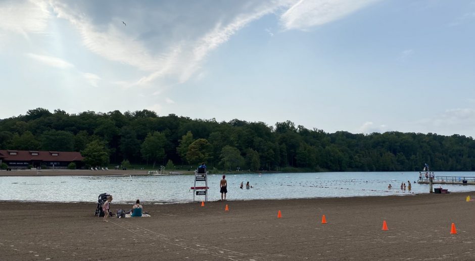 Green Lakes State Park located in CNY has a swimming area open to the public.