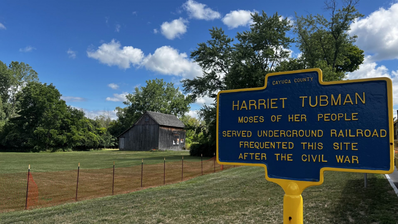 A commemorative plaque welcomes visitors to the Harriet Tubman Home National Park in Auburn