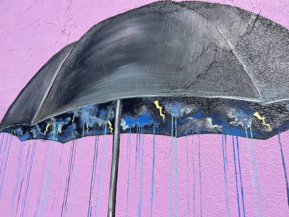 Stormy umbrella painted on wall