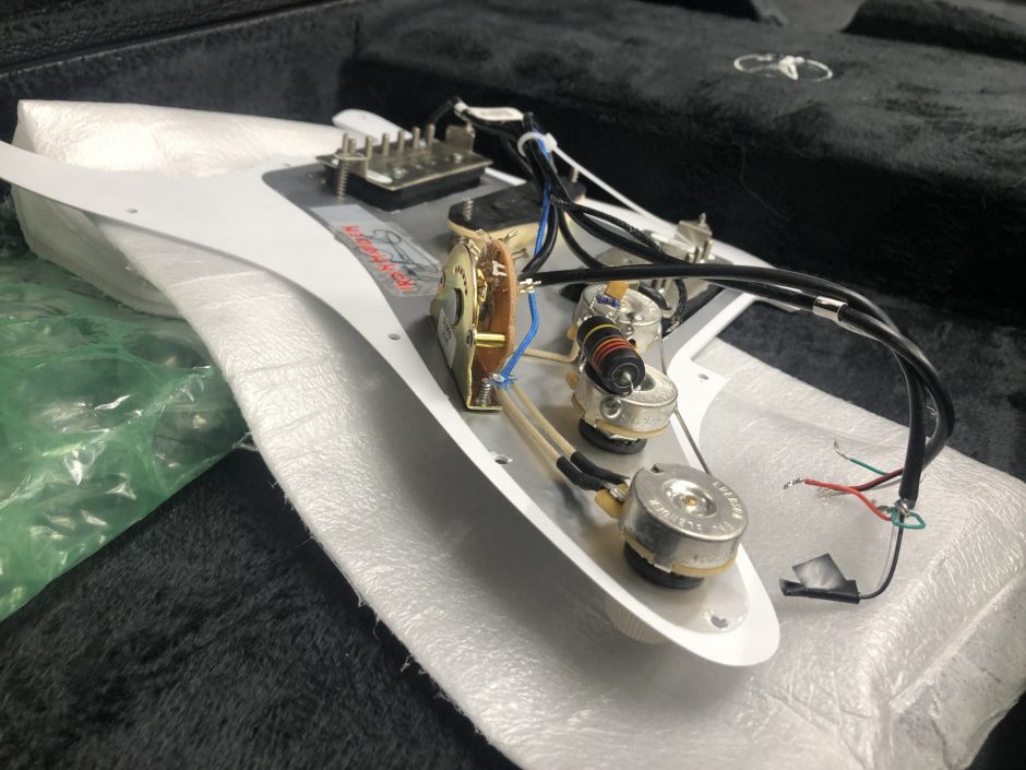 Guitar parts in the Ish Guitars repair room.