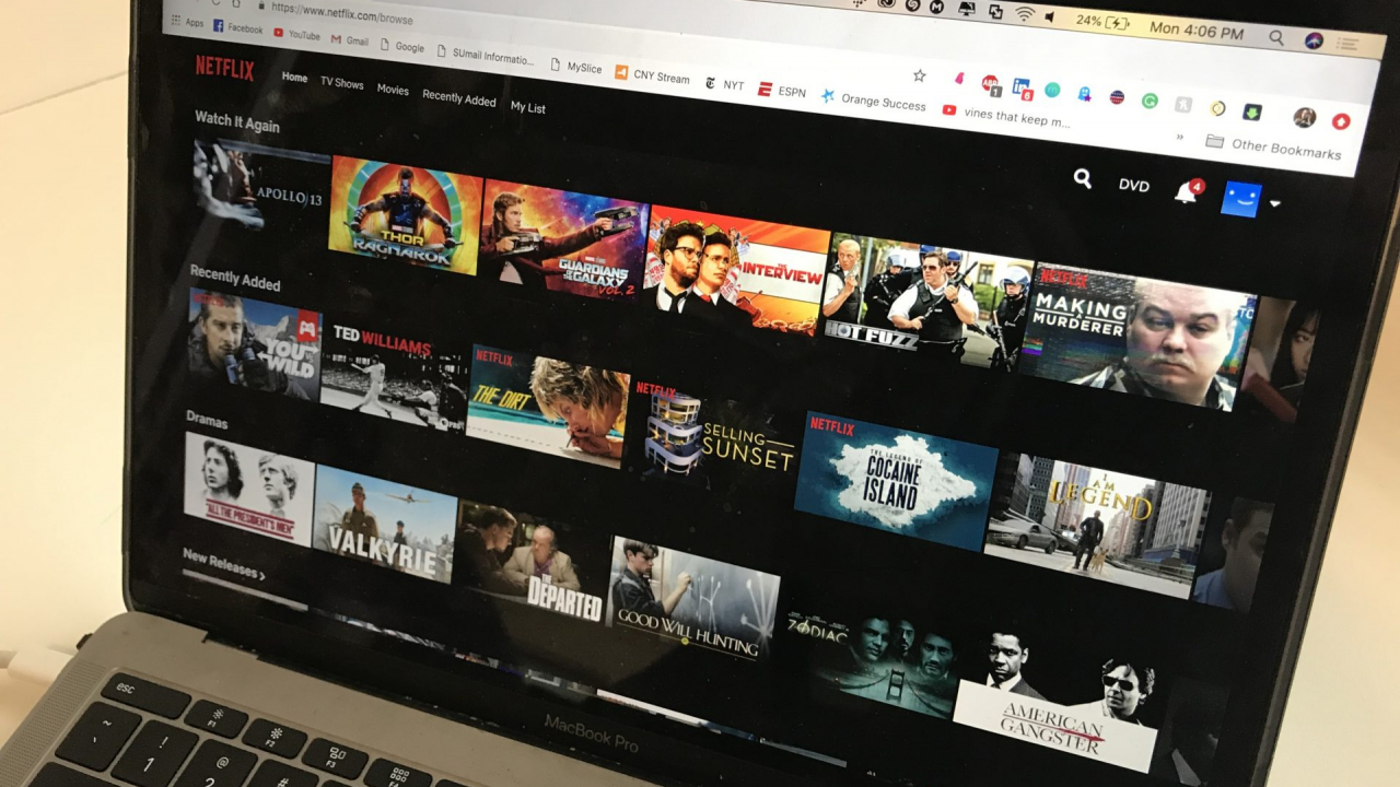 A laptop with the Netflix interface displayed