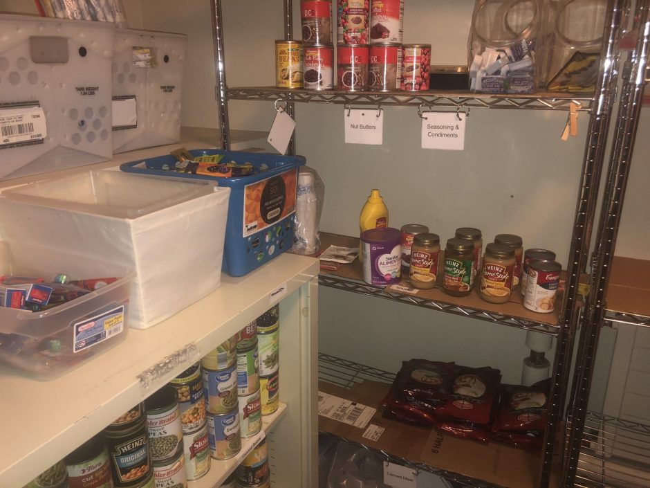 Shelves of food at SU's Food Pantry