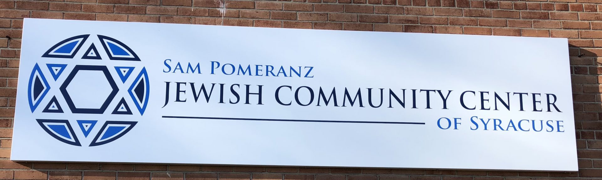 A sign that says "Jewish Community Center"