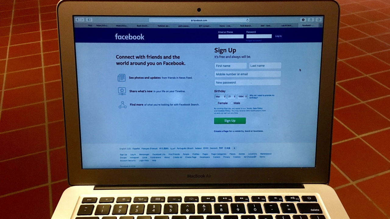 Facebook website opened on a laptop.