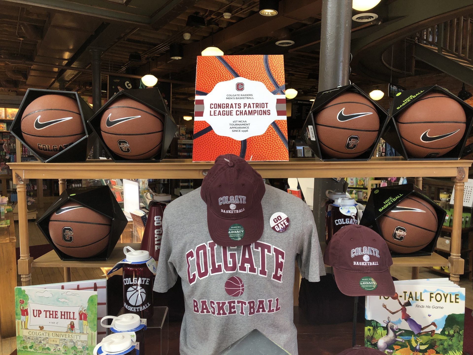 The Colgate Bookstore displays Colgate basketball gear front and center upon entry, congratulating the team on their Patriot League Championship.
