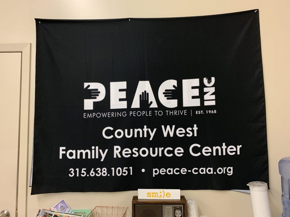 PEACE Inc. Flag, states PEACE Inc, County West Family Resource Center 315-6381051, peace-caa.org