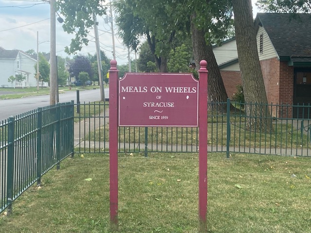 The entrance sign to Meals and Wheels building.