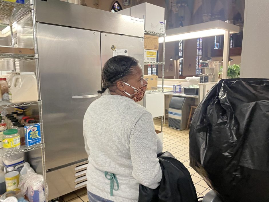 Brenda Mims walks through the kitchen in the Samaritan Center.