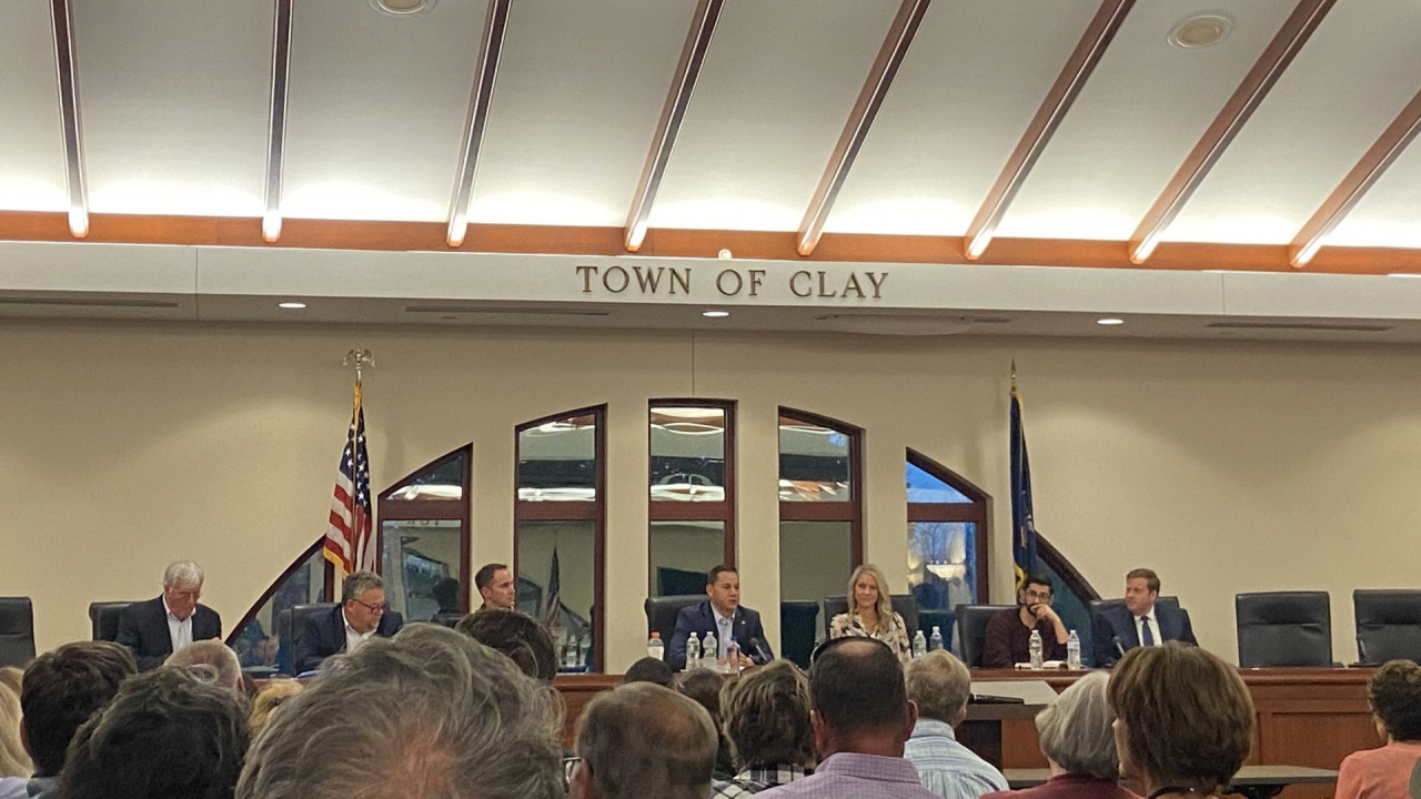 Local residents gather in Clay for a town hall