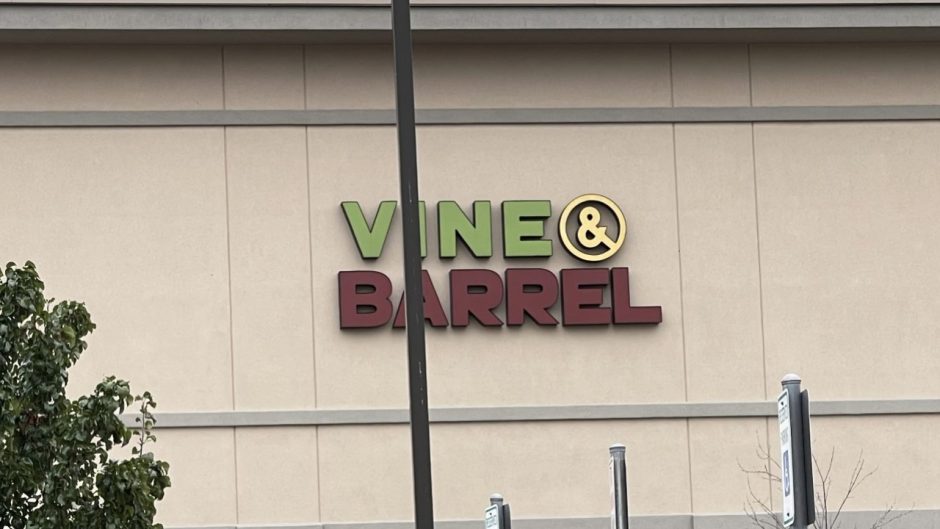 Camillus, N.Y.- Vine and Barrel wine and spirits building sign.