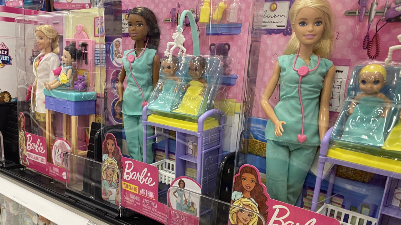 Barbies portray women in medical professions. They are placed alongside the other Mattel toys at Target.