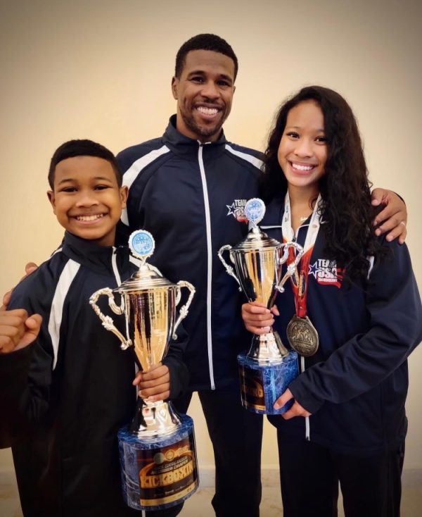 Tahira and her siblings pose with El Java after their victory.