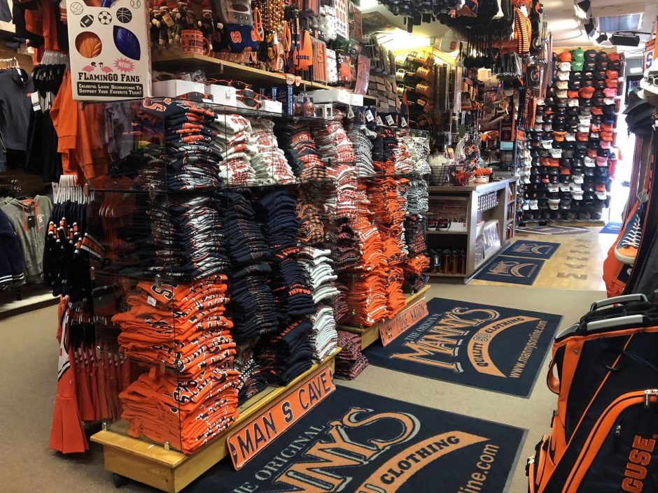 Manny's Quality SU Clothing uses the summer period to organize the fall inventory and prepare for the football season rush of customers.
