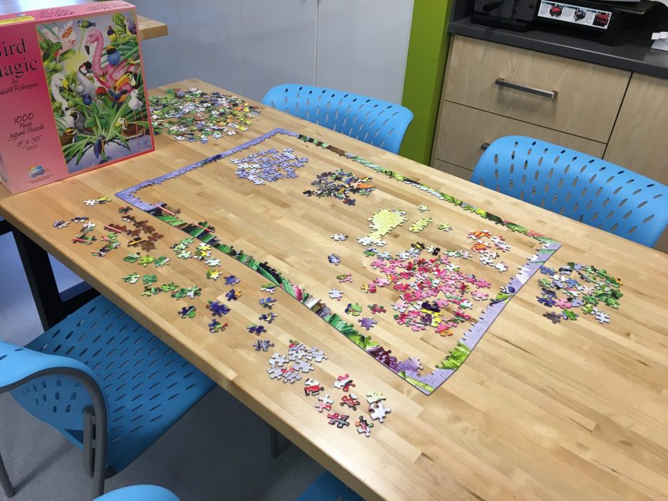 Jigsaw puzzle on a table.