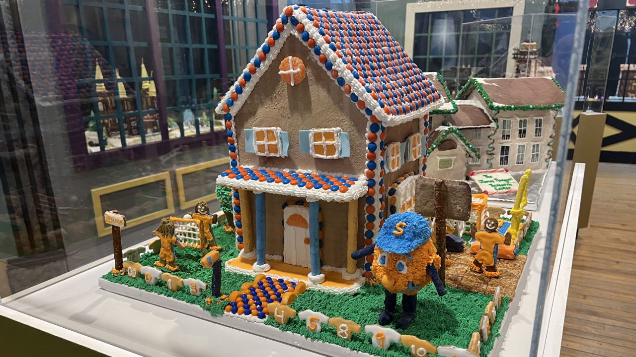 Otto The Orange makes his gingerbread debut in this piece title "Let's Go Orange!"