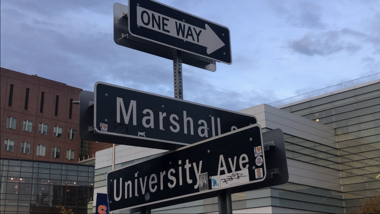 Street signs for intersection of Marshall St. and University Ave.