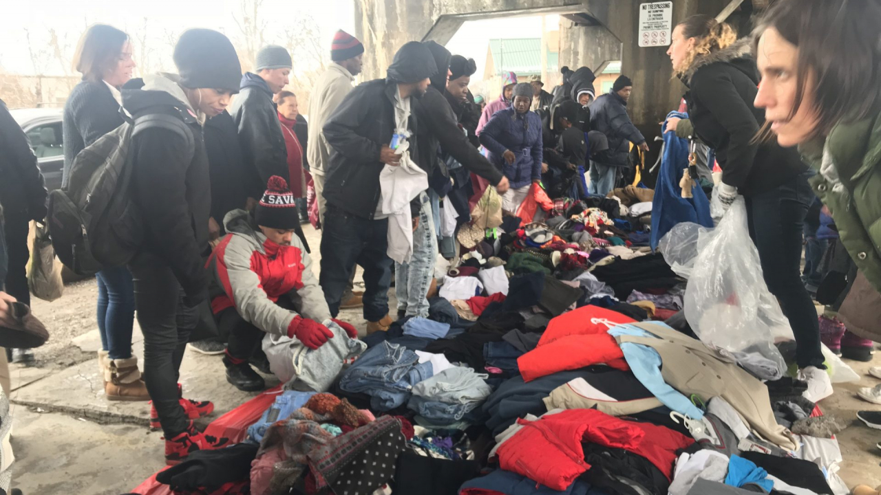 Volunteers distribute winter clothes in Downtown Syracuse
