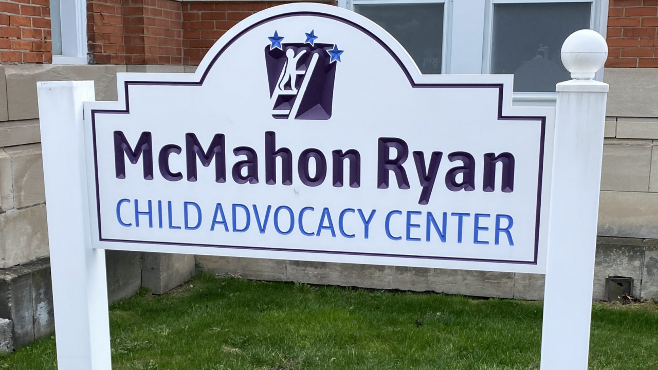 Sign of the McMahon Child Advocacy Center outside the building.