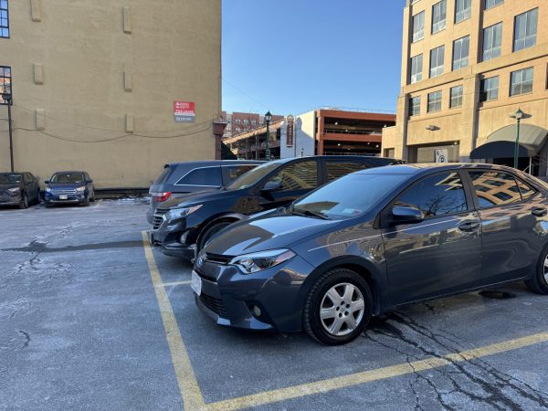 Cars parked in downtown Syracuse.