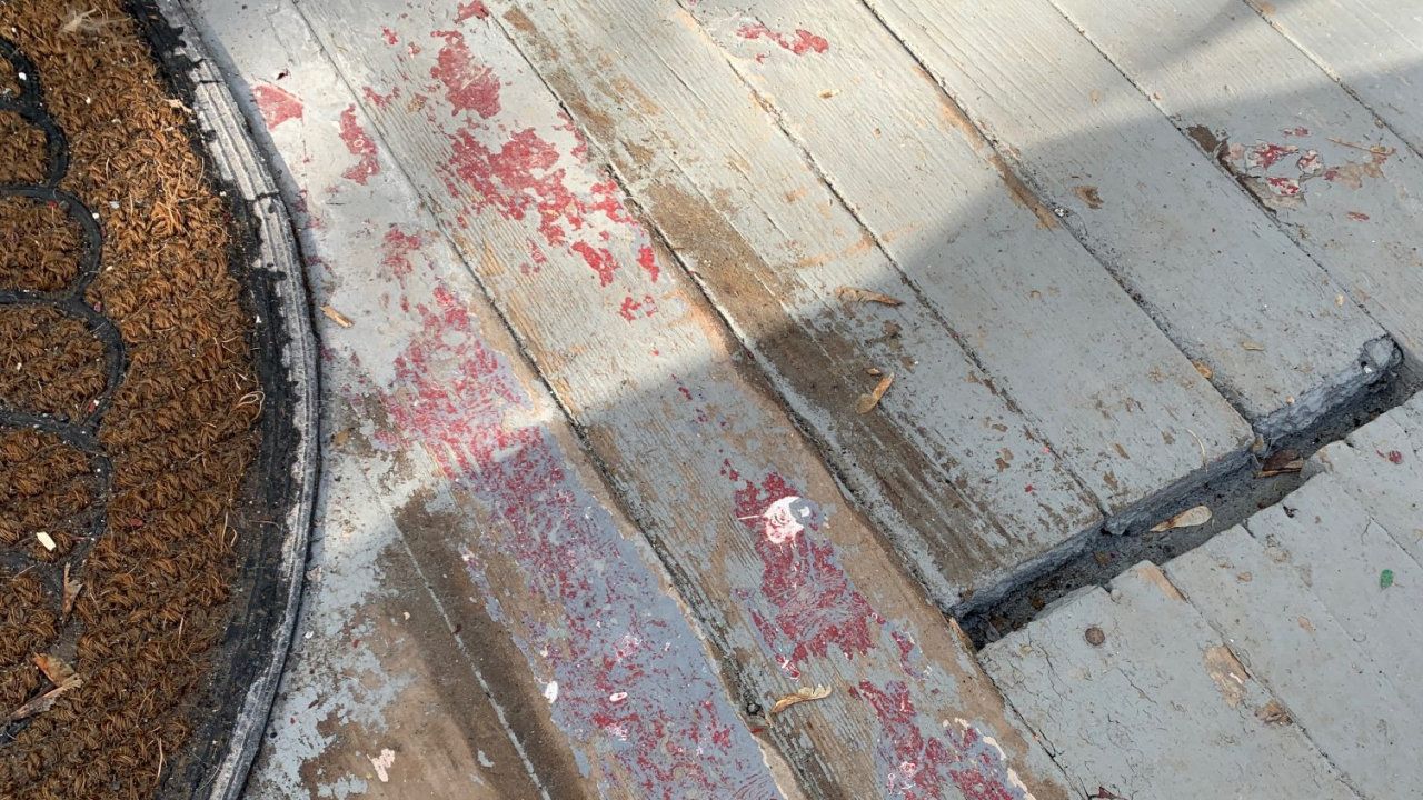 Lead paint seen on the porch of Syracuse home.