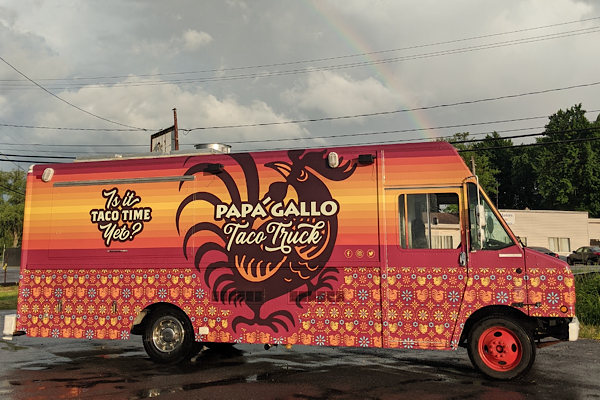 Papa Gallo Taco Truck under rainbow