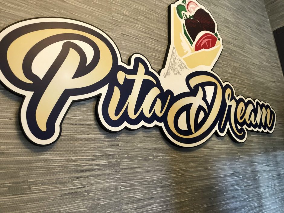 The Pita Dream logo decorates the entryway to the restaurant on Walton Street in Syracuse, New York.