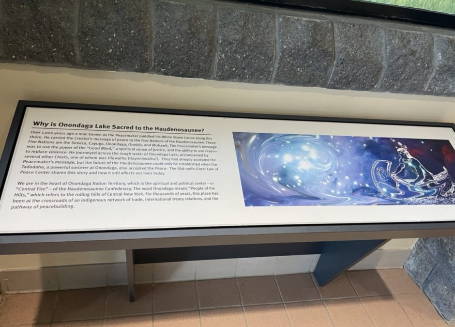 A plaque that is at the entrance of the center. It has a description on why Onondaga Lake is so important to the Haudenosaunee people and a symbolic drawing.