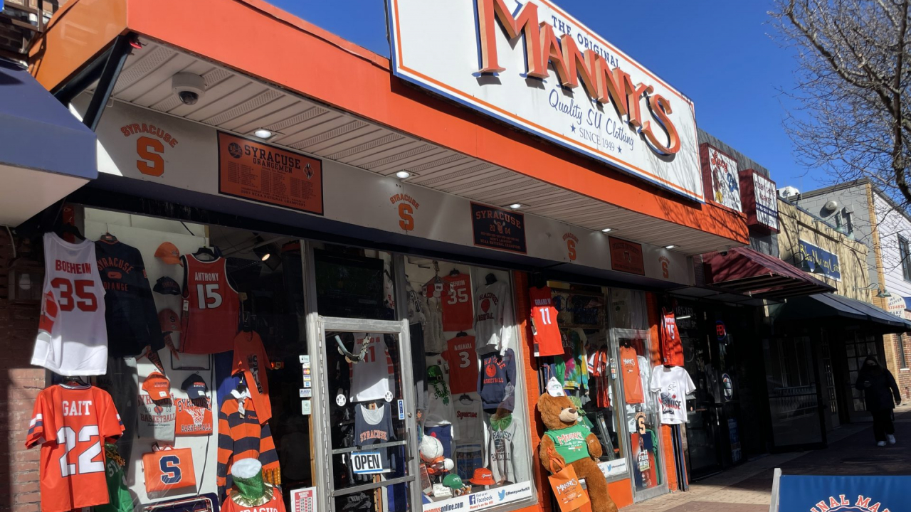 The storefront of Manny's Quality SU Clothing on Marshall Street