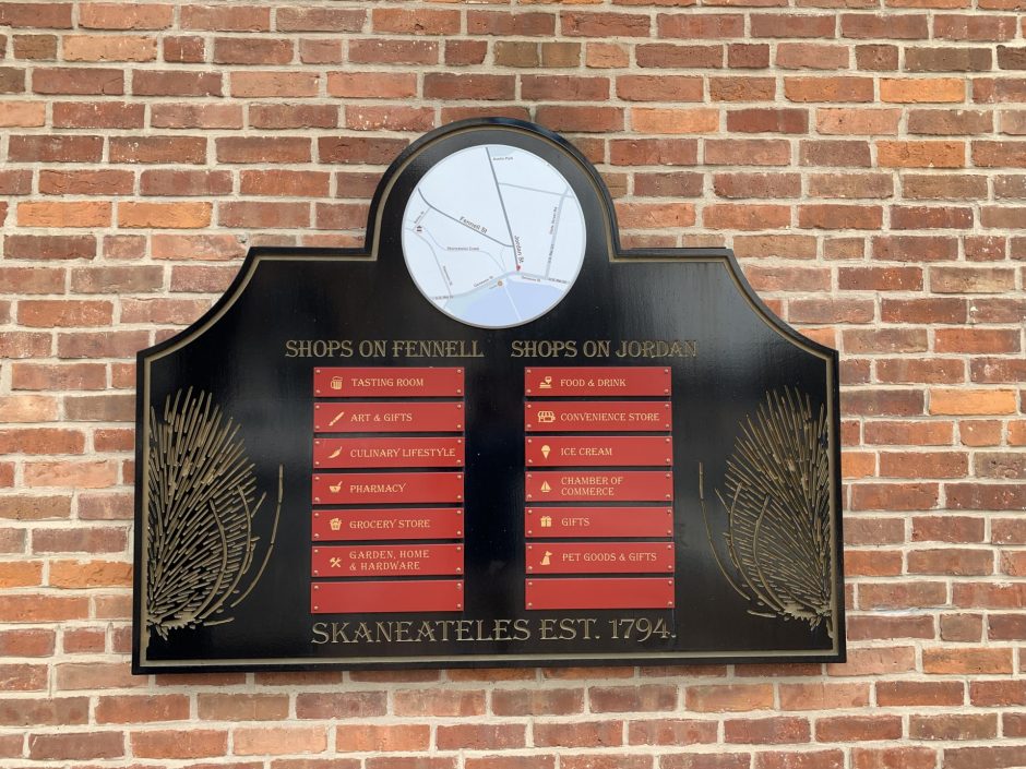 The town sign in the main square of Skaneateles. The town relies heavily on tourism. However, with sporadic temperatures this spring, seasonal businesses have been struggling. 