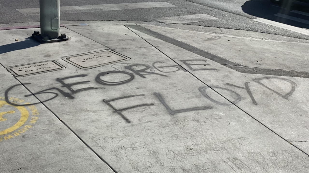 The name of George Floyd, 46, painted on a sidewalk in Los Angeles after a weekend of protests.