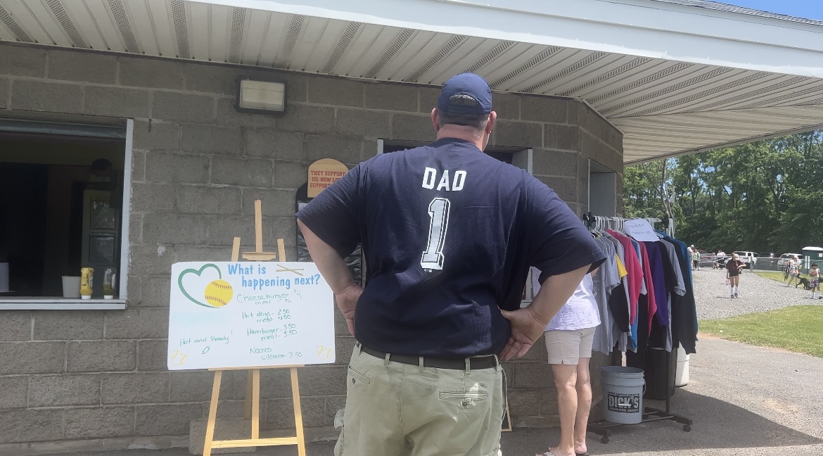 A gift from his daughter on Father's Day to wear during her softball games.