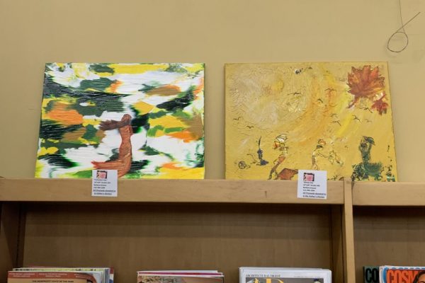 two paintings on display at Petit Library gallery