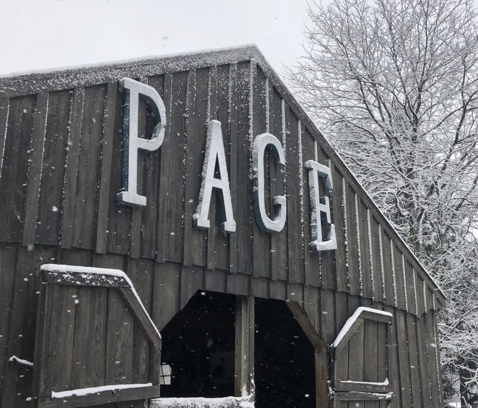 A photo of a barn with the word Page written across it in all capital letters.