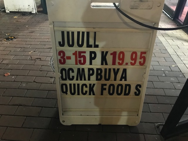 Sign promoting juuls outside Students Choice
