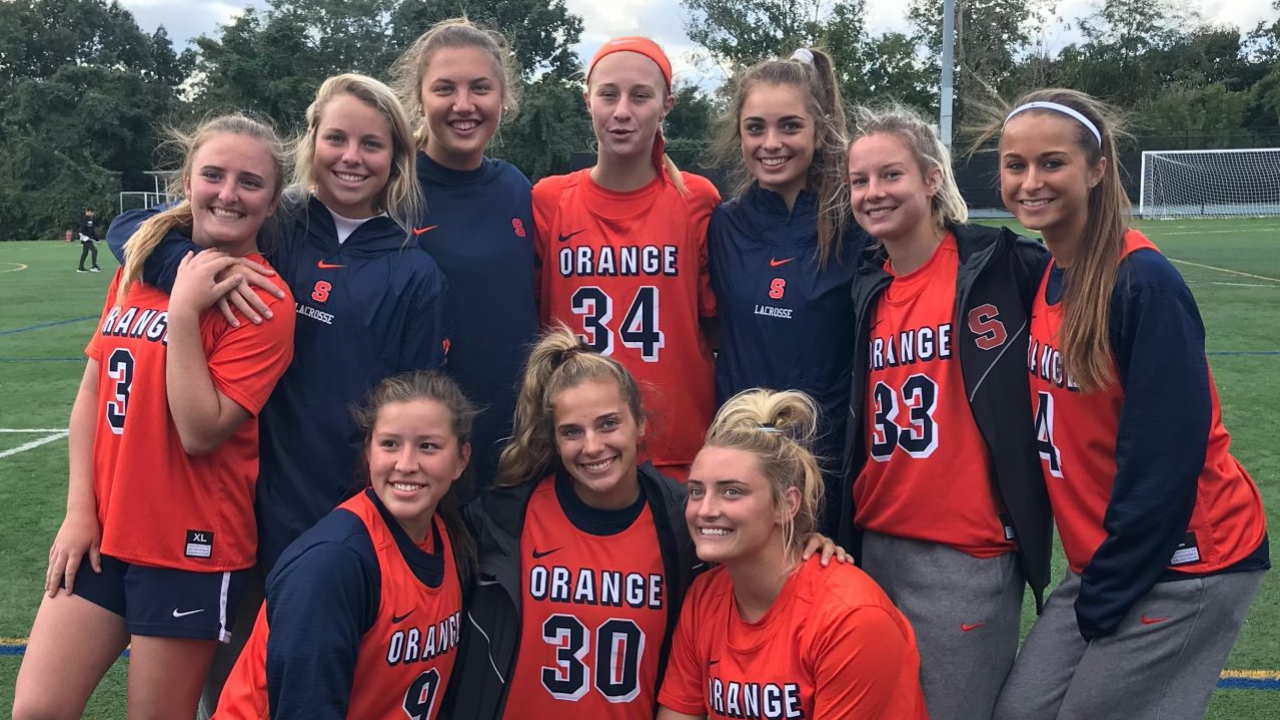 Meaghan Tyrell (pictured far left standing up) and teammates at a fall ball tournament in Manhasset, New York.