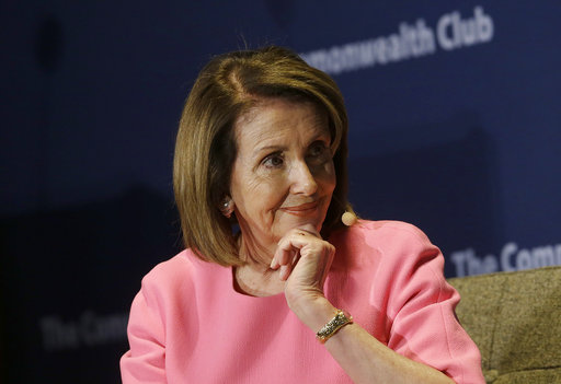 Nancy Pelosi sits on a chair at an event for the Commonwealth Club in San Francisco in 2017